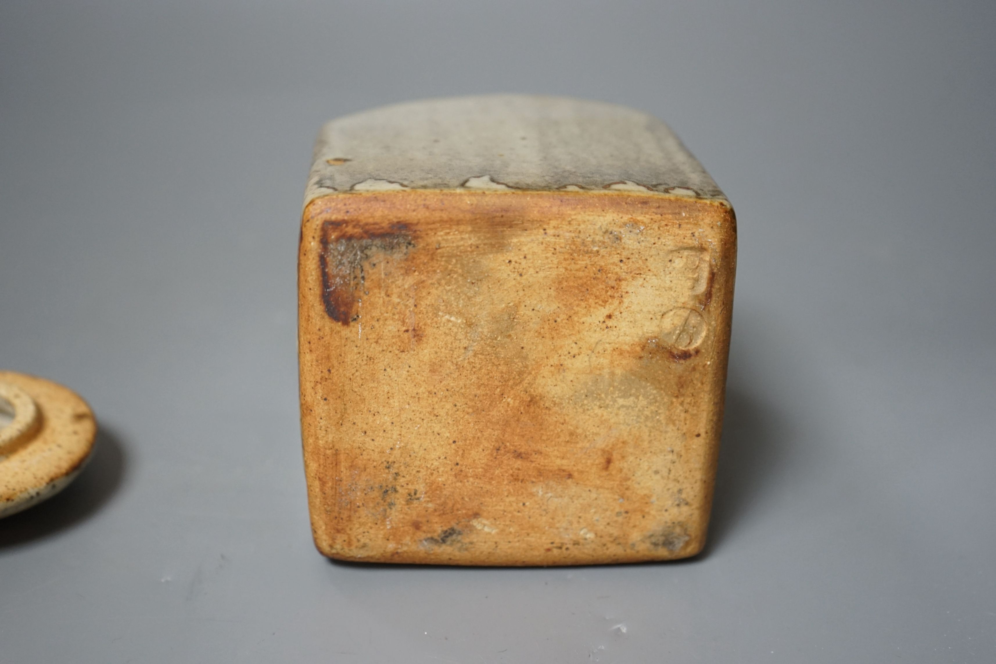 Bernard Leach for St Ives pottery, a mushroom-grey glazed square sided jar and cover, impressed marks to base, 16.5cm tall
